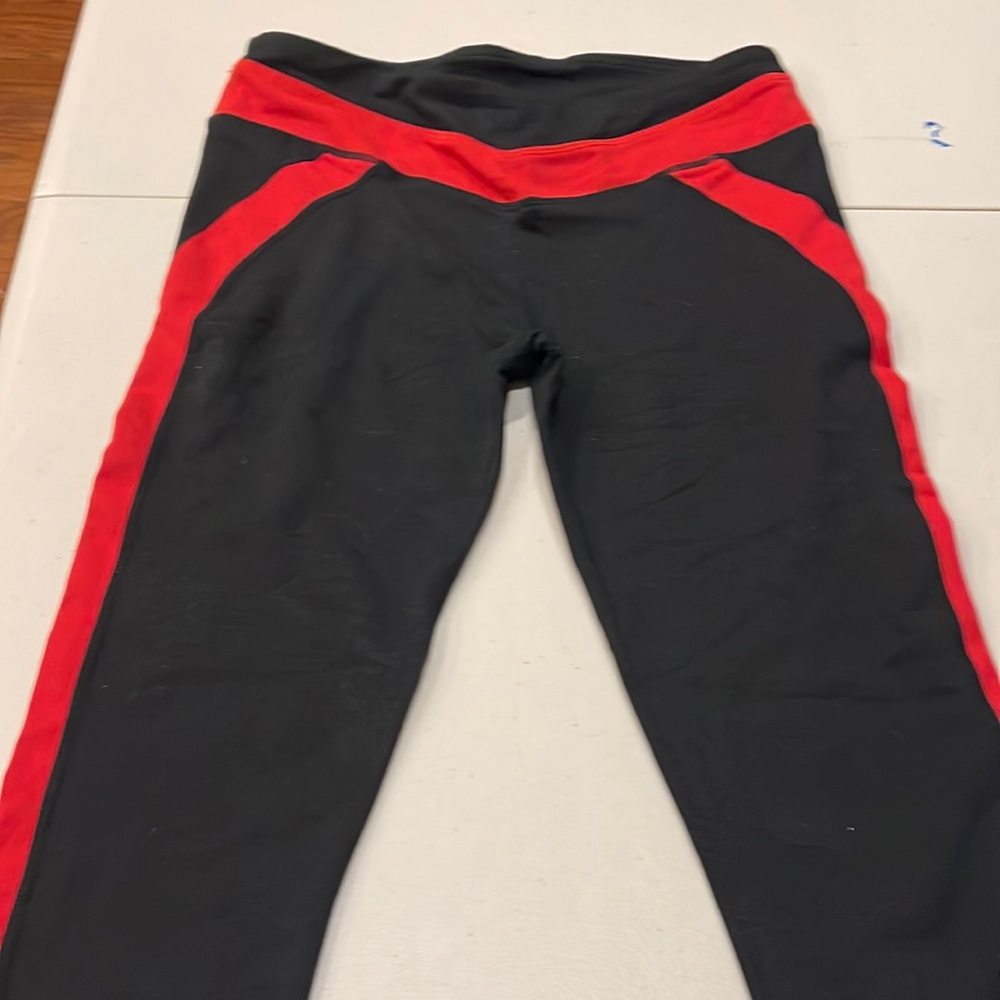 Fabletics Women’s black with red stripe Capri